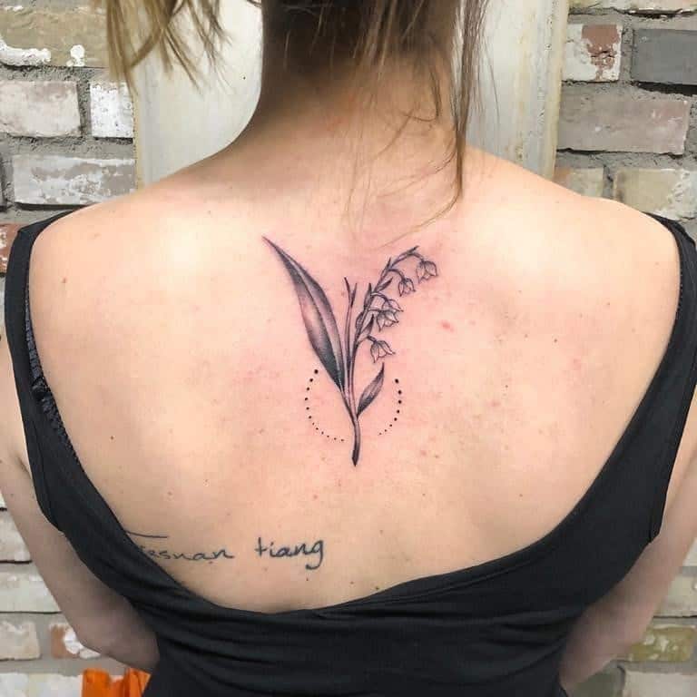 Delicate Lilly of The Valley Back Tattoo