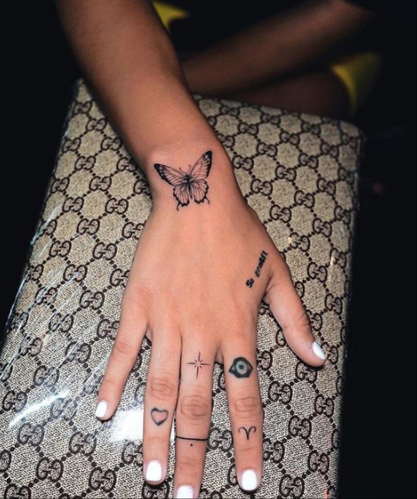 Butterfly hand tattoos for girls 3