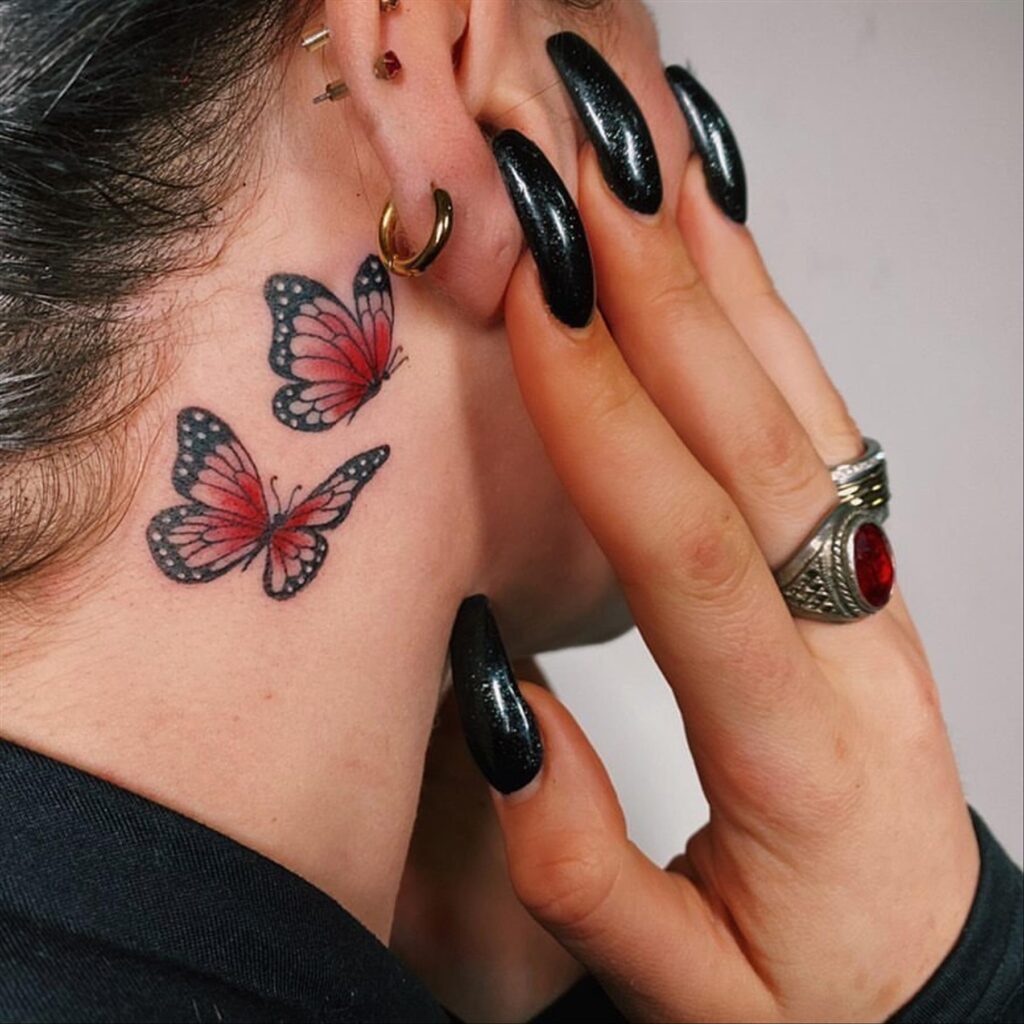 Butterfly tattoos on ear and neck 2