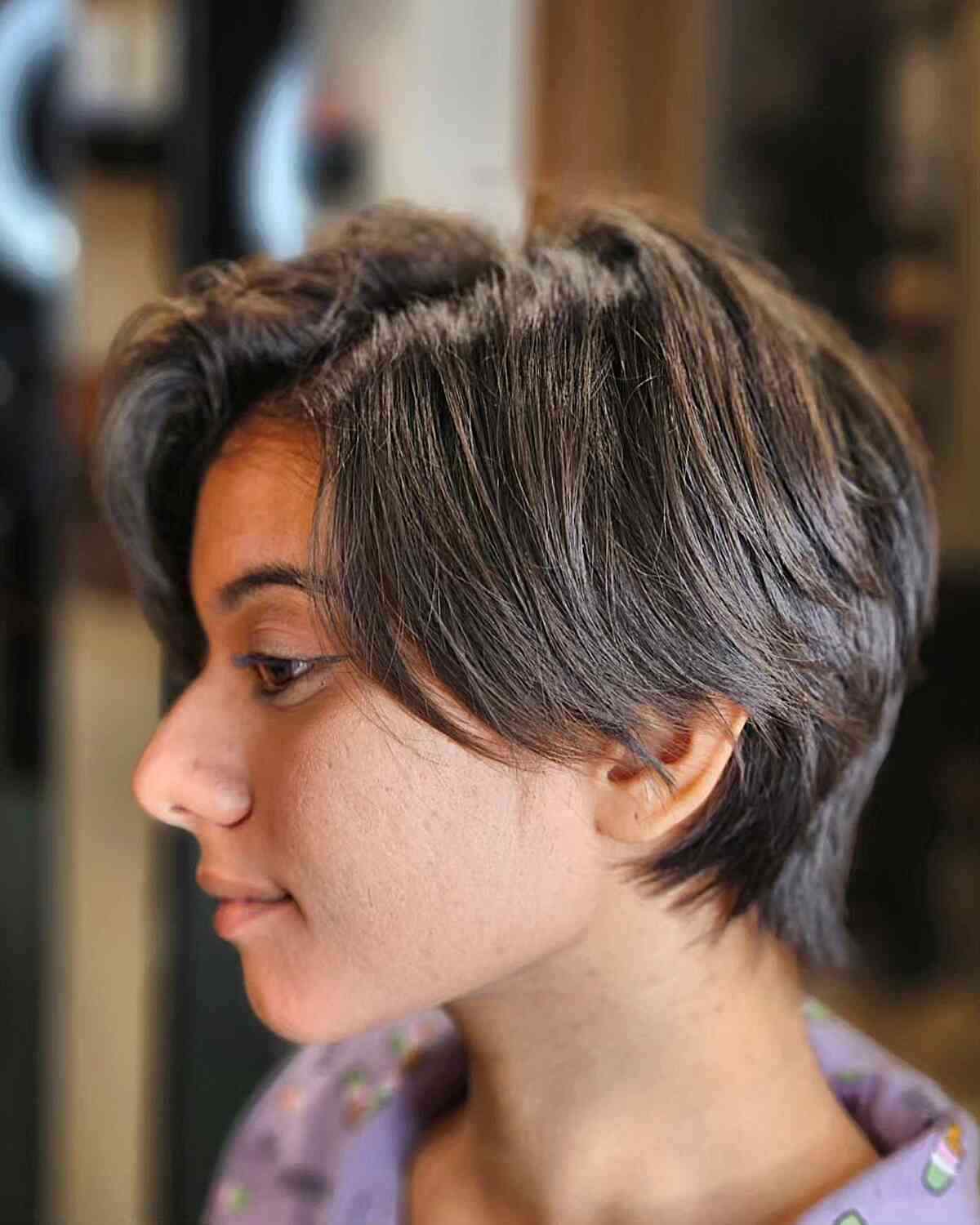 side parted feathered pixie cut for thick hair