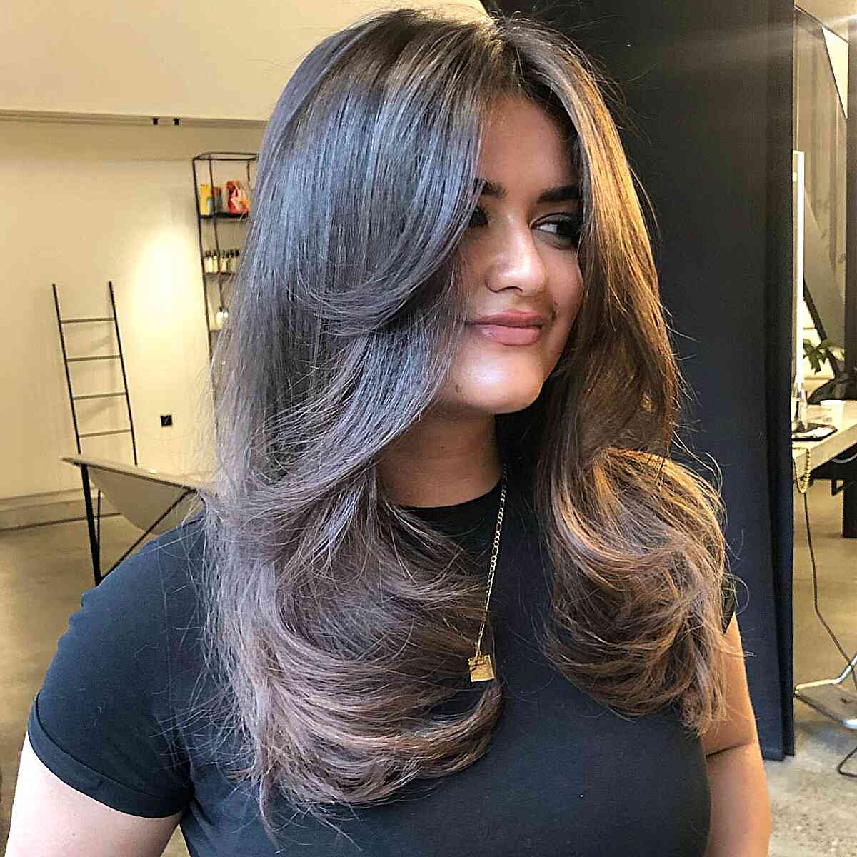 middle part hair with butterfly cut