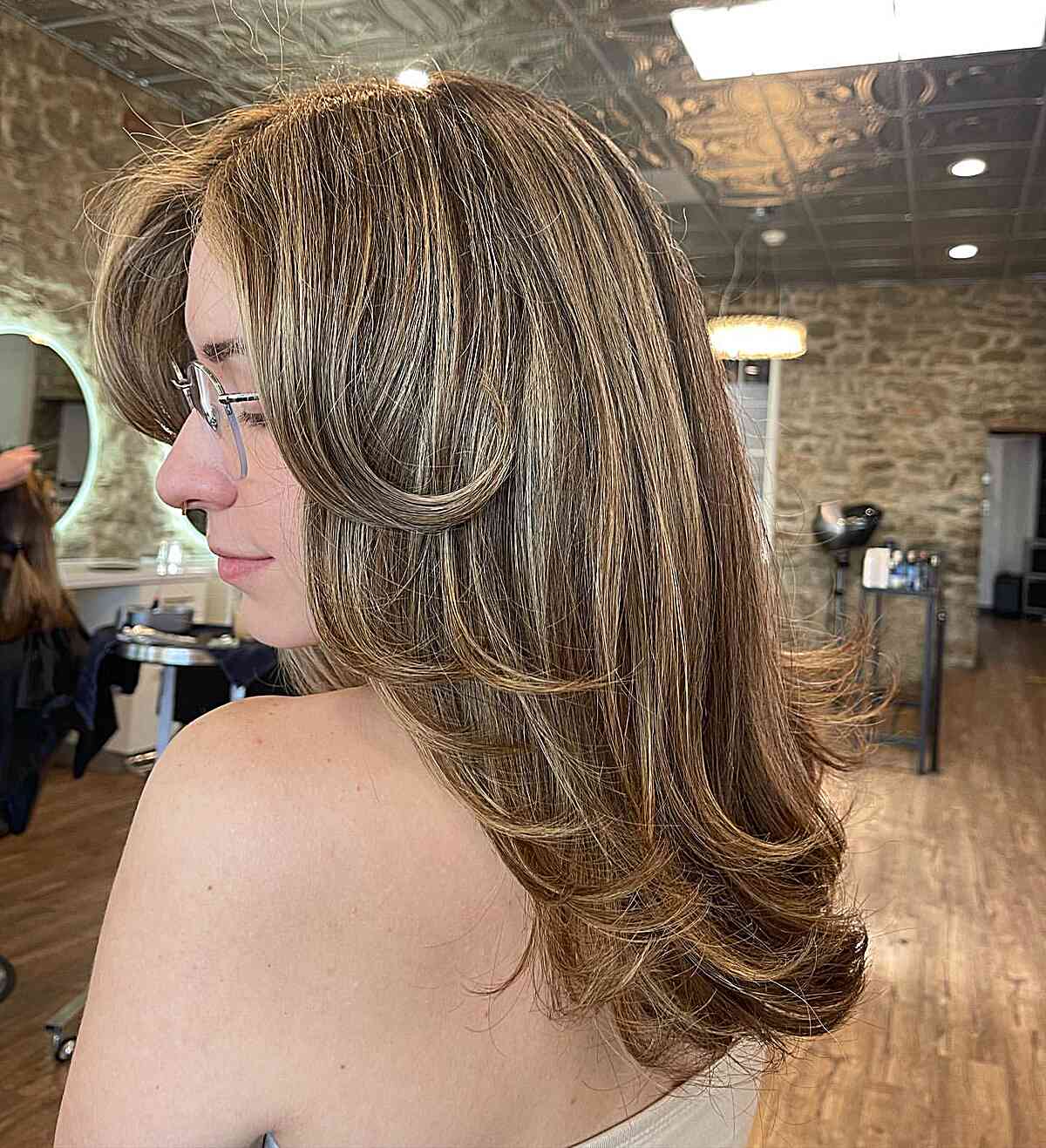 sun kissed blonde butterfly layered hair